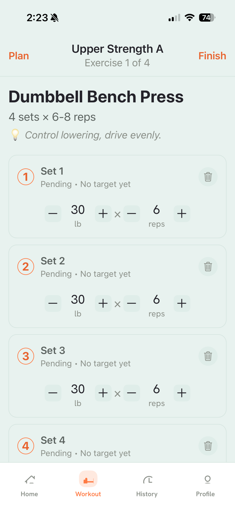 Active workout logging sets, weight, and reps for dumbbell bench press.